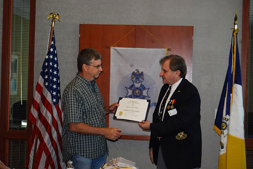 President Dirk Stapleton is shown here presenting a MOSSAR Certificate of Appreciation to Historian Brian Smarker, in recognition of Historian  Smarker's hard work and dilligence in preparing the chapter’s 2010 Yearbook. Upon behalf of MOSSAR and the Harry S. Truman Chapter, we wish to congratulate Historian Smarker for this achievement.