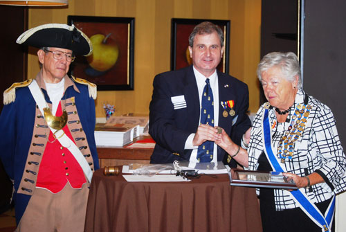Pictured here is NSDAR Vice-President General Mary Lynn Tolle. Presdent Dirk Satplaton and Color Guard Commander Robert L. Grover presented NSDAR Vice-President General Mary Lynn Tolle with the MOSSAR Silver Medal for her active support in both NSSAR and MOSSAR.  NSDAR VPG Tolle also received the Harry S. Truman Chapter coin. In addition, the Harry S. Truman Chapter appreciates the support of the seven local DAR Chapters who also attended.
