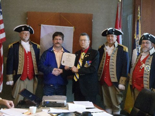 President Robert L. Grover and the Harry S. Truman Color Guard, are shown here conducting a New Member Induction for Compatriot Eric Munson, who was inducted into the SAR for his ancestor Patriot Abraham Van Horn, Sr. Patriot Van Horn was an Issuing forage-master, and in 1782 was a Private in Captain Richard Stillwells' Company of the New Jersey Militia.