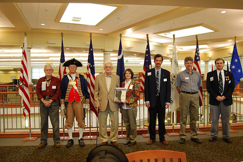 Pictured here is Compatriot Harry Dexheimer and members of the Harry S. Truman Chapter, who participated in a dedication ceremony on April 9, 2011, in which chapter member Harry Dexheimer donated the latest version of NSSAR Directory to the Midwest Genealogical Library in Independence, MO. The Midwest Genealogy Center (MGC) is one of the nation's preeminent resources for family history. The Genealogy Center features 52,000 square feet of space to house all the resources and technology.