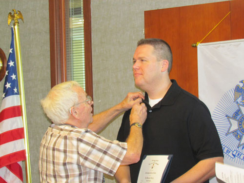 The Harry S. Truman Chapter inducted Compatriot Christopher Vedder into the ranks at the 323rd Meeting on Saturday, May 12, 2012. President Dirk A. Stapleton and the Harry S. Truman Chapter Color Guard officiated during the ceremony.  President Dirk Stapleton presented Compatriot Christopher Vedder with his membership oath, membership certificate, and challenge coin.