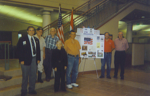 The Harry S. Truman Chapter conducted a Genealogy Workshop on Saturday, September 12, 2009 at the at the Midwest Genealogy Center in Independence, Missouri.  Compatriot David McCAnn conducted the Genealogy Workshop.  Harry S. Truman Chapter members are shown here near the Harry S. Truman Chapter SAR kiosk and display area which promotes SAR.  In addition, the display also promotes the Color Guard.