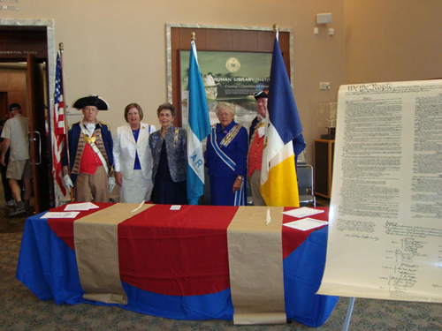 The Harry S. Truman Color Guard and Missouri DAR members participated in a U. S. Naturalization Ceremony, hosted at the Harry S.Truman Library, in Independence, Missouri on Thursday, September 17, 2009.  The Color Guard Commander, Major General Robert Grover and Captain James L. Scott, are shown here with Mary Lynn Tolle, Honorary State Regent, Missouri and Vice President General NSDAR and other area DAR members, during Constitution Week 2009.