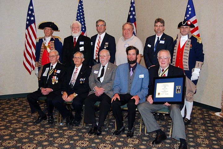Pictured here is the Harry S. Truman Color Guard Team and members of the Harry S. Truman Chapter, taken at the 24th Annual George Washington Birthday Celebration in Overland Park, KS on February 20, 2010. Compatriot Romie Carr is shown here after being presented the Silver Good Citizenship Medal at the GWBC.