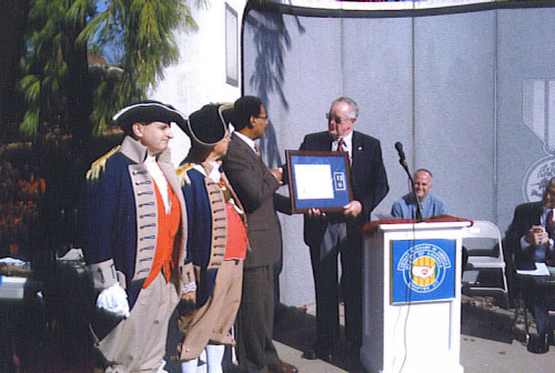 Pictured is the distinguished guest Congressman Emanuel Cleaver II, with Compatriot Romie Carr, and the MOSSAR Color Guard Team on Veterans Day 2009. Compatriot Romie Carr, who is a Vietnam veteran, and on behalf of MOSSAR, presented the SAR Silver Good Citizenship Medal to U.S. Representative Emanuel Cleaver. This award was in recognition of the outstanding program that the Congressman sponsored at the Harry S. Truman Library in September 2009 honoring the Vietnam Veterans.
