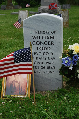 Private William C. Todd, was born on Feb. 26, 1843, his father was Jonathan Conger Todd and his mother was Mary Elizabeth (Hubbard ) Todd. He had seven brothers and three sisters. He enlisted in the Eleventh Kansas Volunteer Cavalry Co. D., Private, on Aug. 25, 1862 and mustered in on Sept.13, 1862. He died at Independence Mo., on Dec. 3, 1864, from wounds he received at Platte Bridge in Dacotan Ter. He's on the rosters as being from Oskaloosa, Kansas.