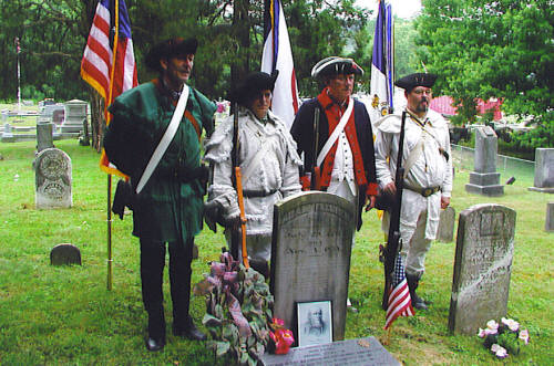 Pictured here with the National Society Daughters of the American Revolution, is the WVSSAR and MOSSAR Color Guard Teams on Saturday, July 1 2006. The team participated in the grave marking ceremony of Revolutionary War Soldier Adam Flesher.  Patriot Adam Flesher is buried in the Riverside Cemetery in Weston, West Virginia.