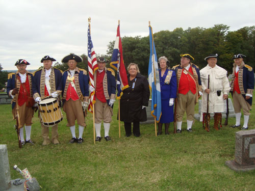 Pictured here is the MOSSAR Color Guard team at a Grave Marking for Dora Elizabeth Hudspeth Slaughter, an Independence Pioneers Chapter DAR Chapter member who is buried at Buckner Hill Cemetery in Buckner, Missouri. The MOSSAR Color Guard team is shown here on Wednesday, October 16, 2013.