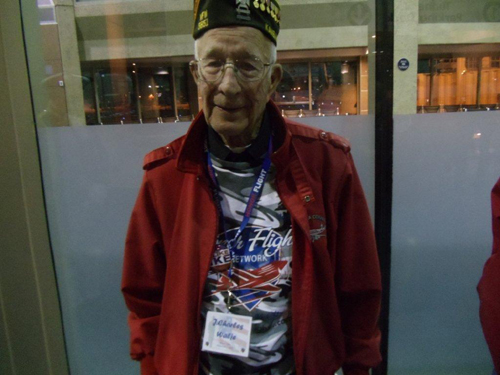  WWII veteran J. Charles Walje, Army Signal Corps, Pacific Theater; is shown here after being greeted from the return flight at the Honor Flight Greeting for WW II Veterans at Kansas City International on Wednesday evening, November 7, 2012.