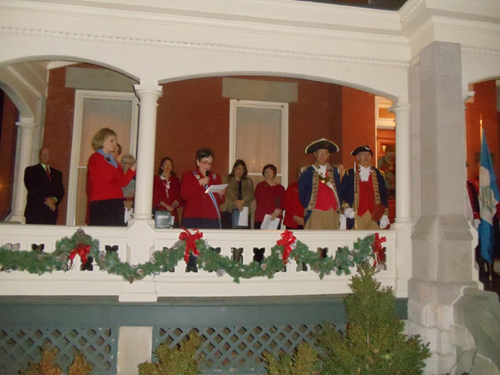 The MOSSAR Color Guard is shown here participating in a Tree Lighting Ceremony on Friday, November 30, 2012 located at Roslyn Heights, which is the Headquarters of the Missouri State Society of the Daughters of the American Revolution in Boonville, MO. The Missouri State Society of the Daughters of the American Revolution, hosted an opening ceremony for their annual Christmas open house at 5:30 p.m. November, 30th at 821 Main St. in Boonville.