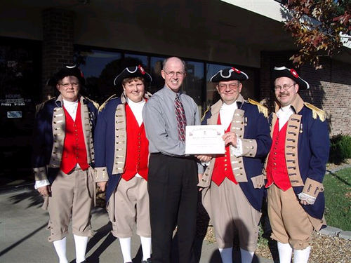 Pictured here is a Flag Certificate Award being presented on October 24, 2006 by the MOSSAR Color Guard team to Citizens National Bank of Springfield, MO
